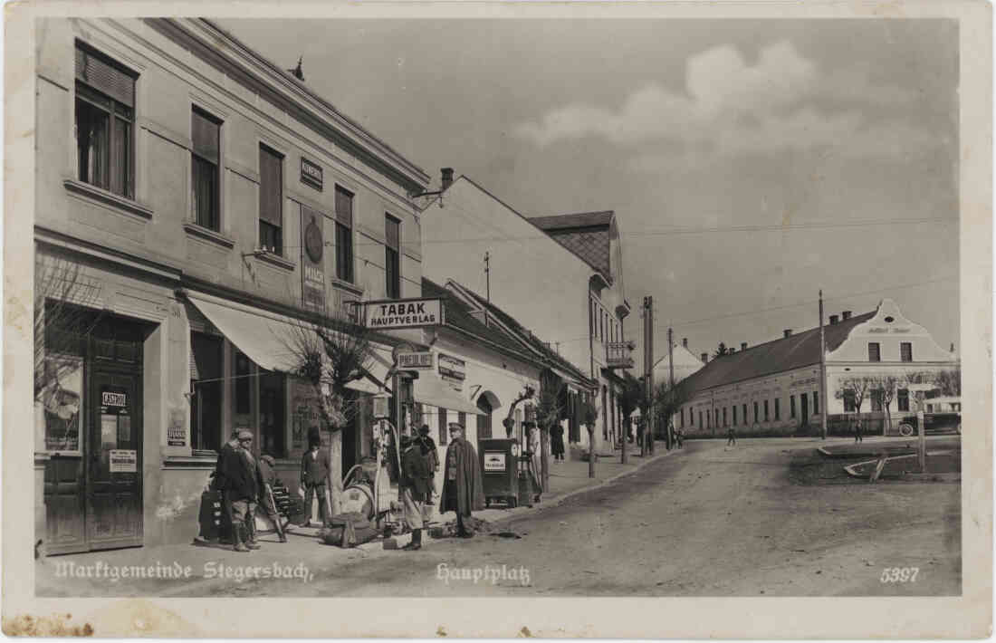 Marktgemeinde Stegersbach, Hauptplatz, Herrengasse mit dem Kaufhaus Radnetter und dem Csar Haus, Kaufhaus Krammer und dem Gasthof Bauer